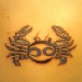 Foto tattoo segno dello zodiaco del cancro