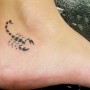 Foto tatuaggio Piccolo scorpione sul piede