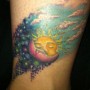 Foto tatuaggio sole luna e nuvole