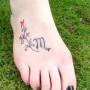 Tatuaggio segno zodiacale scorpione sul piede