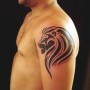 Tatuaggio testa di leone sul braccio immagine