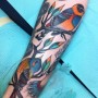 Foto tatuaggio uccelli colorati