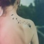 Immagine di tatuaggio di uccellini che volano