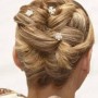 Acconciatura raccolta sposa 2013 con capelli lisci
