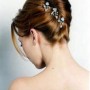 Acconciatura raccolta twist sposa 2013