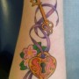 Immagine tatuaggio lucchetto cuore con chiave