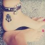 Immagine tatuaggio fiocco con ancora