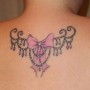 Immagine tatuaggio fiocco sulla schiena