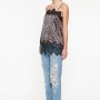 Jeans con strappi e top maculato Twin Set estate 2014