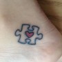 Tatuaggio Tassello Puzzle con piccolo cuore