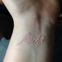 Immagine Tatuaggio bianco con scritta