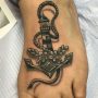 Tatuaggio Faro con Ancora