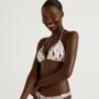 Benetton costume da bagno a triangolo con giraffe estate 2021