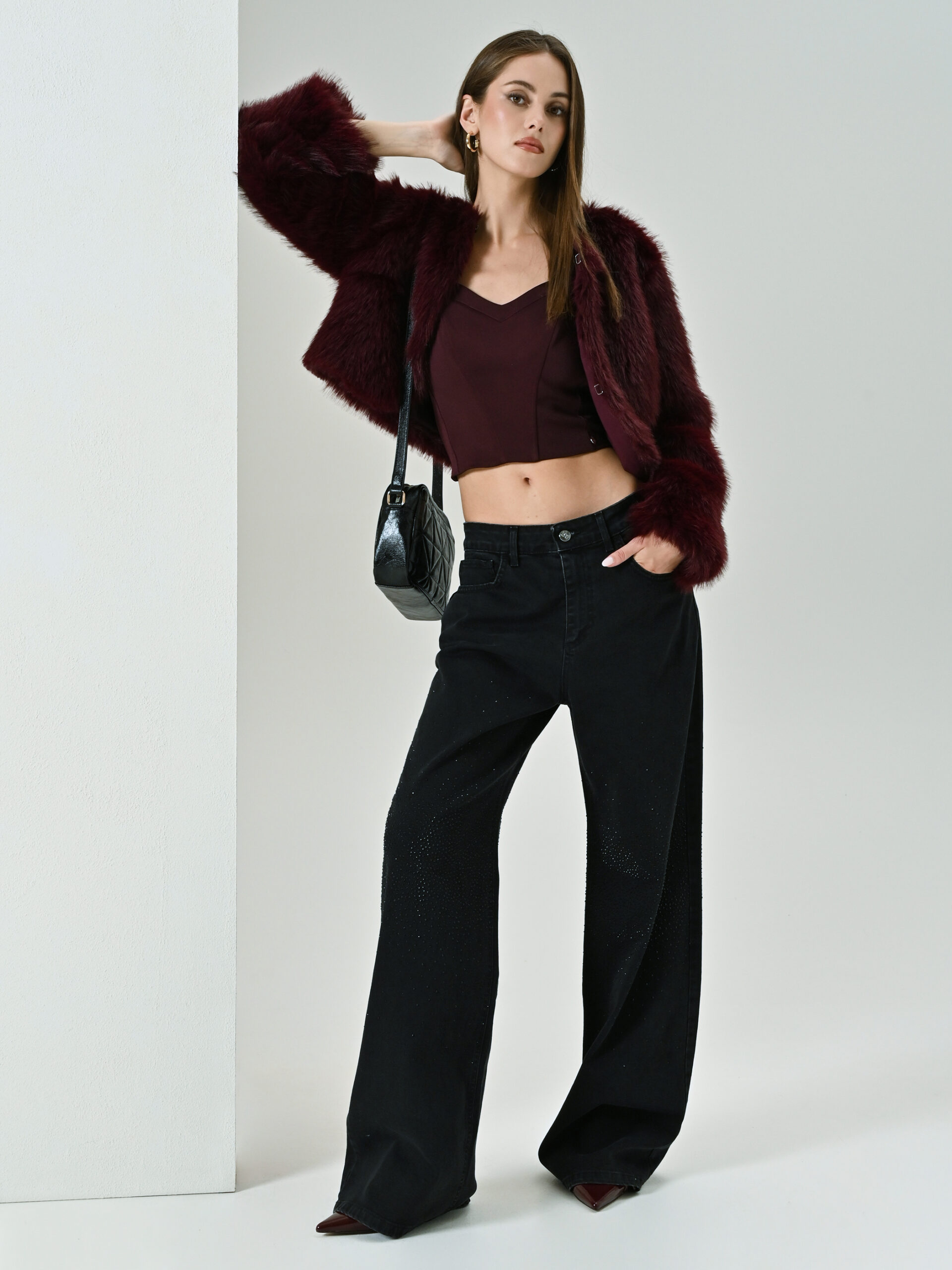 Jeans neri con micro strass Rinascimento inverno 2026